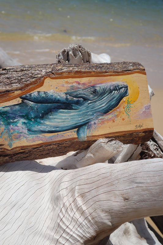 Whale Guide on timber