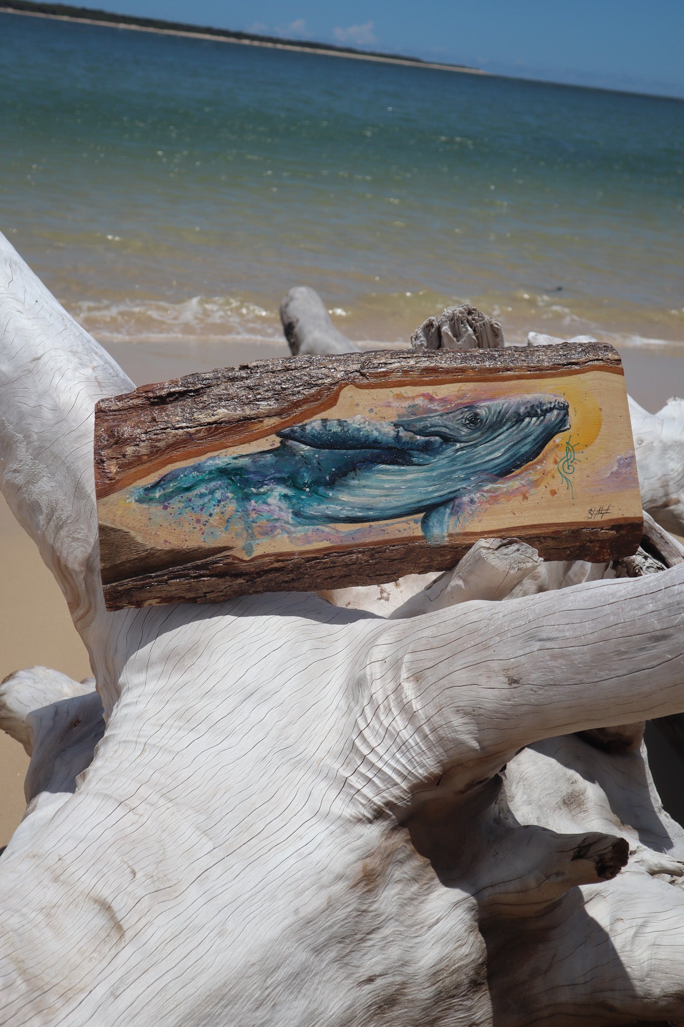 Whale Guide on timber