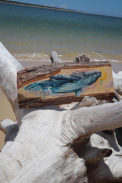 Whale Guide on timber